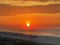 Two bedroom condo with deck overlooking the ocean. Private beach!