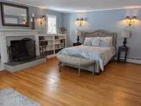 Enjoy comfortable elegance in this secluded grand home located in town