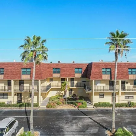 Affordable ONE BR Main Floor Condo RIGHT ON THE BEACH w/ KING Bed & Heated POOL!
