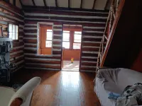 Beautiful full log cabin with  direct private frontage , beautiful sunsets .