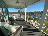 Raised home right on the Caloosahatchee River. Come enjoy the water and weather