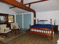 Country living at it's best! Rustic 1908 Barn nestled on 2.5 acres of old oaks