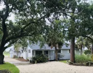 Private Waterfront Family Complex with Dock, Walk to Beach. Angler's Dream.