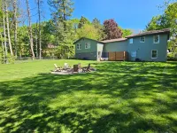 Cozy Home Near Downtown w/ Hot Tub, Fire Pit, Bikes, King Bed, and Full Kitchen