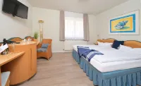 Hotel- & Ferienanlage Kapitäns-Häuser Breege Hotels in Juliusruh