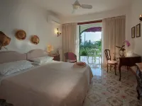 Semiramis Hotel de Charme & Pools Hotels near Citara Beach