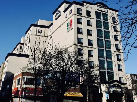 Marco LaGuardia Hotel and Suites Отели рядом с достопримечательностью «Free Synagogue of Flushing»