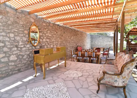 Assos Assinos Отели рядом с достопримечательностью «Behramkale»