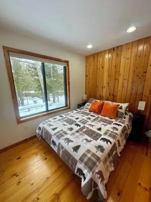 Riverside Cabin Near Torch Lake – Kayaks Included!