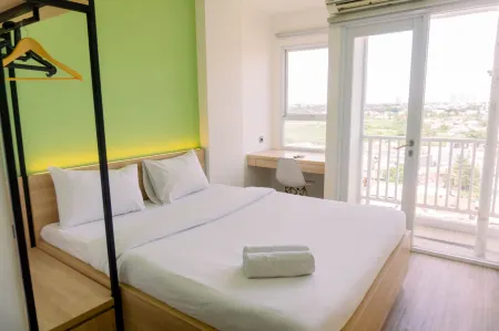 Homey and Cozy Living Studio Poris 88 Apartment