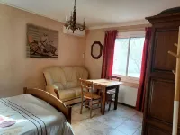 Cottage with private garden in wooded property with swimming pool