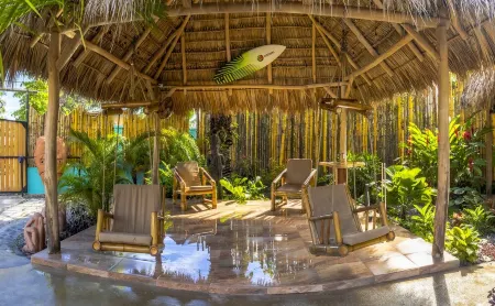 Private beach house paradise w/ private pool bar and game area.