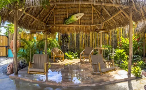 Private beach house paradise w/ private pool bar and game area.