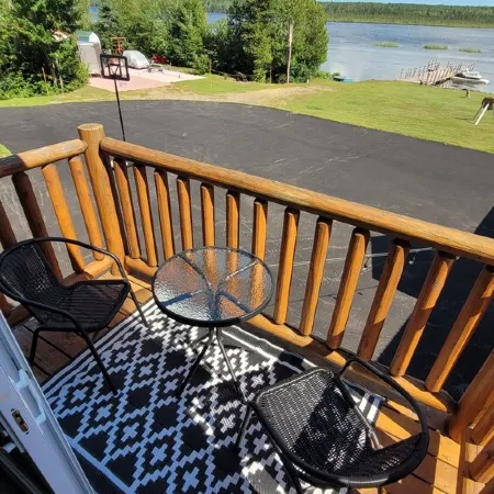 Modern Costa Del Sol Flat Overlooking Pokemouche River, with swimming off dock.