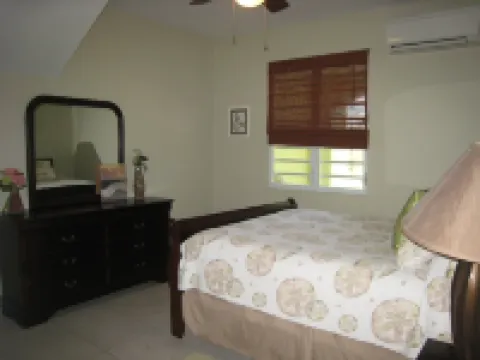 Spacious, attractively decorated 2 BR 1bath gated Apt, 4 Mins to Jobos Beach