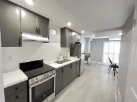 One bedroom ensuite toilet on main level & kitchen, living, bathroom lower level