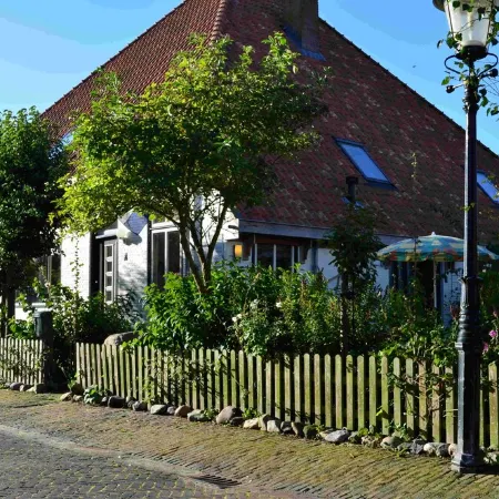 Stylish apartment with garden in a former farmhouse in De Waal