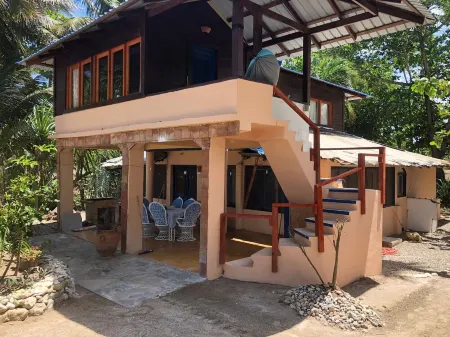 Authentic Beachfront Caribbean Hideaway-Crashing Surf, Palms, & Tradewinds!