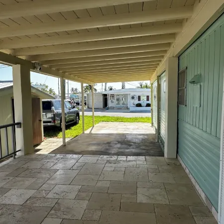 Canal-Front Coastal Escape with Private Dock & King Suite