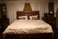 Camp OM Riverside Retreat Отели в г. Чамоли