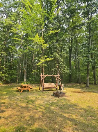 Quiet Higgins Lake home close to ATV trail, Boat Launch, and Silver Dollar!