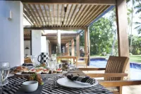 Beachfront villa with pool and full staff