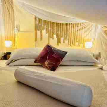 Island style Loft in tropical greenery of Diniwid beach Rooms