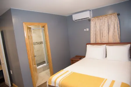 Charming 2-Bedroom Apartment with AC, WiFi and Parking space inGeorgetown