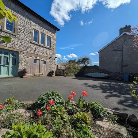 Cosy yet spacious property with private parking, close to the village centre.