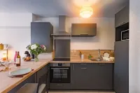 Cosy Apartment with Large Balcony and Private Parking
