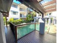 5 mins walk to town and beach. Family sized top floor condo!