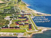 4 person holiday home on a holiday park in Lemvig