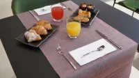 UNAHOTELS 拉馬特拉 - 早餐