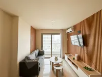 Lovely and Vibrant 2BR Space at Praxis Apartment by Travelio