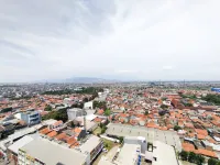 Spacious and Cozy 2BR Apartment Mekarwangi Square Cibaduyut By Travelio