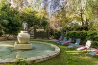 Village Boutique Hotel Hotels near Flintstone Creations