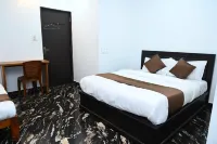 Hotel Palace Lodge Отели рядом с достопримечательностью «Ammembala Sri Somanatheshwara Temple»