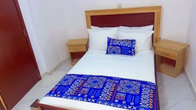 Touraco Suite Hôtel Business Hôtels à proximité de : Parc Exotique du Sénégal
