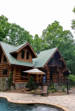 Rustic cabin sitting on acres of pastures nestled in the mountains of North GA