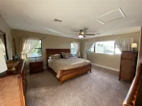 Watch Florida sunsets from the covered lakefront dock Hotels in Minneola