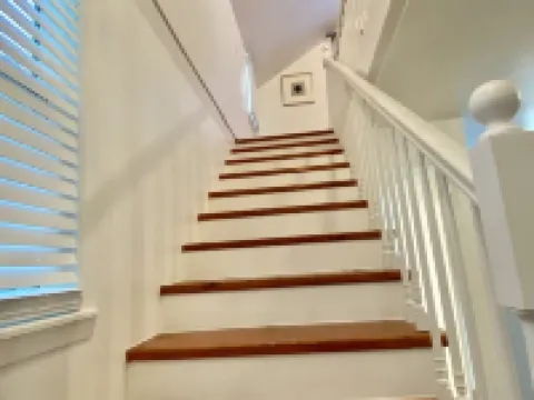 Experience History in an original Carriage House located behind a Colonial home. Hotels in Mena