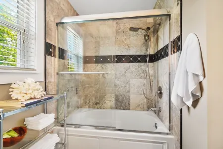 High-end home w/ fireplace, gourmet kitchen, sauna, game rm/ large yard/fire pit