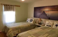 IDLE HOUR, a tranquil 3 bedroom 1.5 bath cottage WITH DOCK