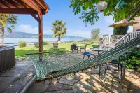 Luxurious 3000sq ft Lakefront Home on Point surrounded by Nature and Views!