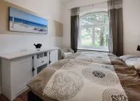 Ferienwohnung Jakob, mit Garten, Terrasse und Strandkorb