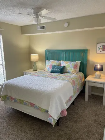 Waterfront 2 bedroom condo with pool, boat ramp and slips