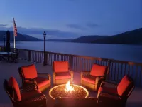WELCOME TO ON THE ROCK - A RECENTLY RENOVATED  BEAUTIFUL LAKE FRONT HOME