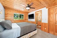 Secluded 4-season cabin w/private waterfront, epic game room & mins from trails