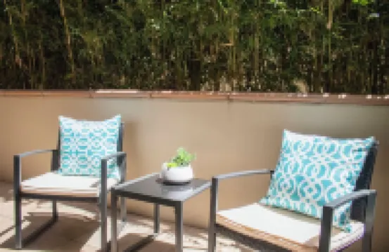 Pets Stay Free • Private Terrace • Elevator • King Beds • In-Unit W/D