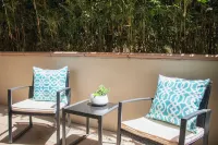 Pets Stay Free • Private Terrace • Elevator • King Beds • In-Unit W/D